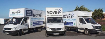 Three removal vans parked in a fan shape